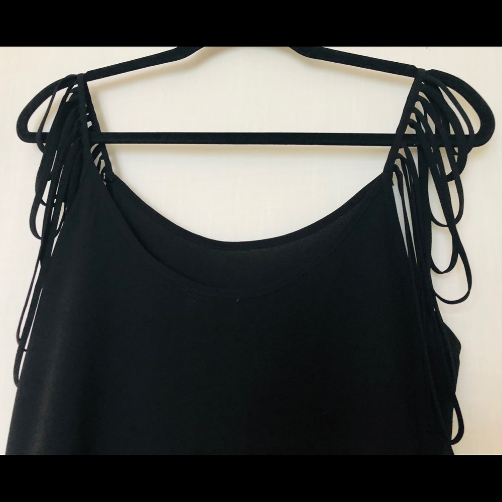 Beautiful sexy crêpe and shear lined top.